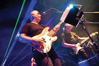 Guitarist Pat Potter, right, and bassist Lou Portela lead House of Floyd during a performance at El Morro Theater Tuesday. © 2011 Gallup Independent / Cable Hoover 